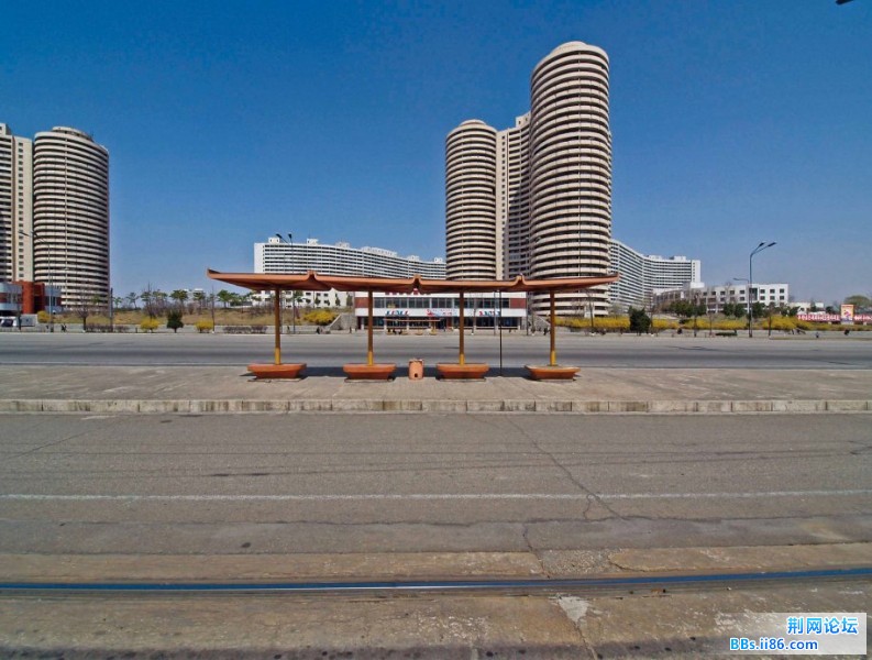 a-view-of-cylindrical-residential-towers-and-wave-shaped-housing-slabs.jpg